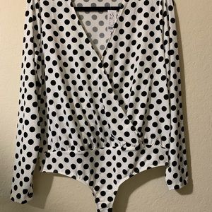 Black and white polkadot bodysuit from New York and Company size large.